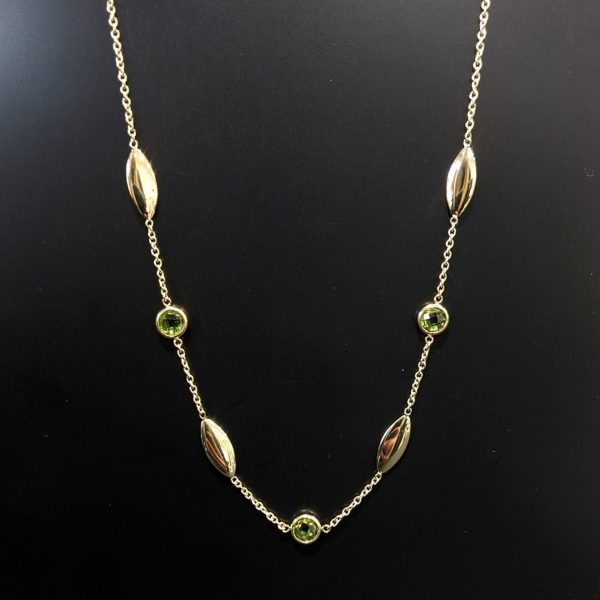birthstone necklace. peridot gemstone and gold ladies necklace
