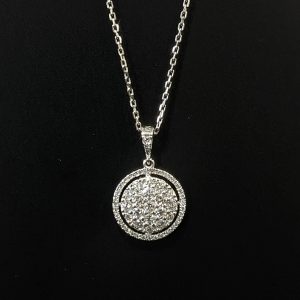 diamond ladies necklace with a diamond halo handmade in 18ct white gold