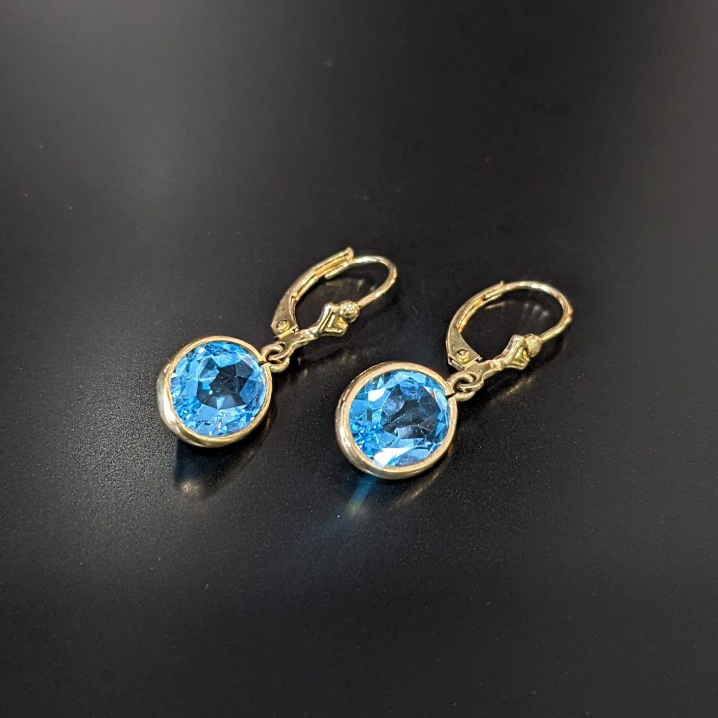 gemstone earrings for women featuring blue topaz and yellow gold handmade in melbourne