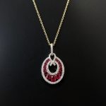 ladies necklace with ruby and diamond pendant and gold chain