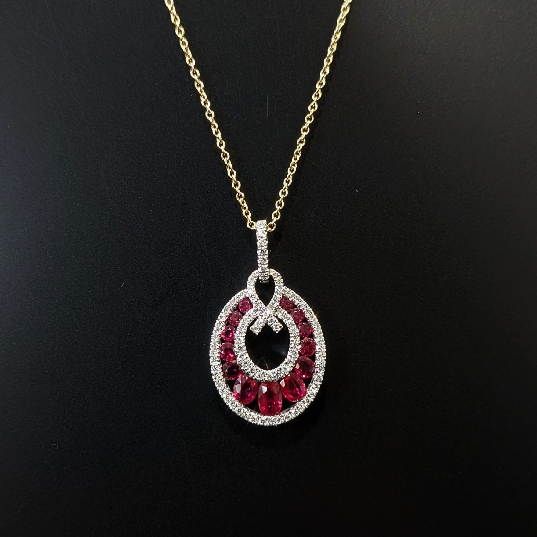 ladies necklace with ruby and diamond pendant and gold chain