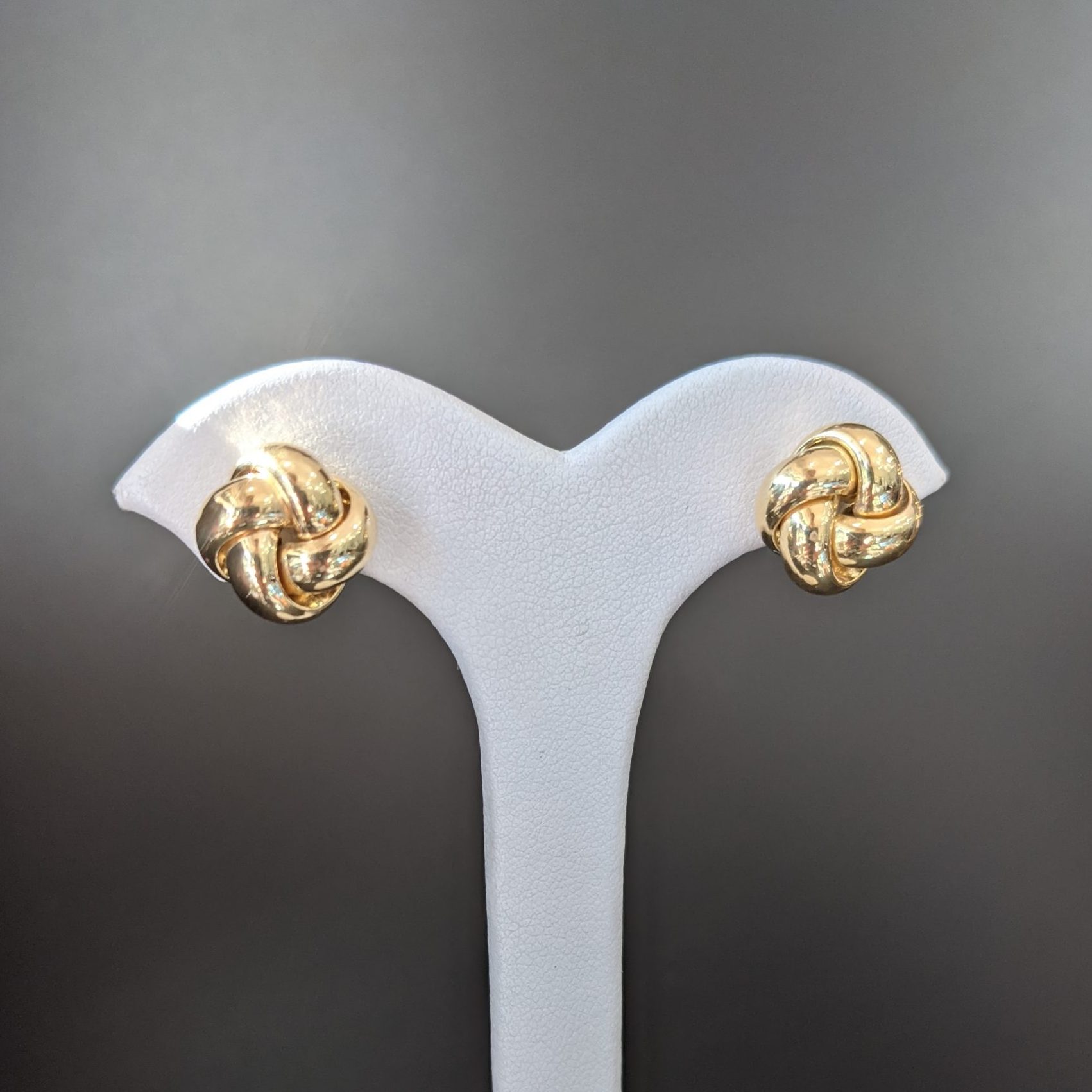 Gold knot stud earrings